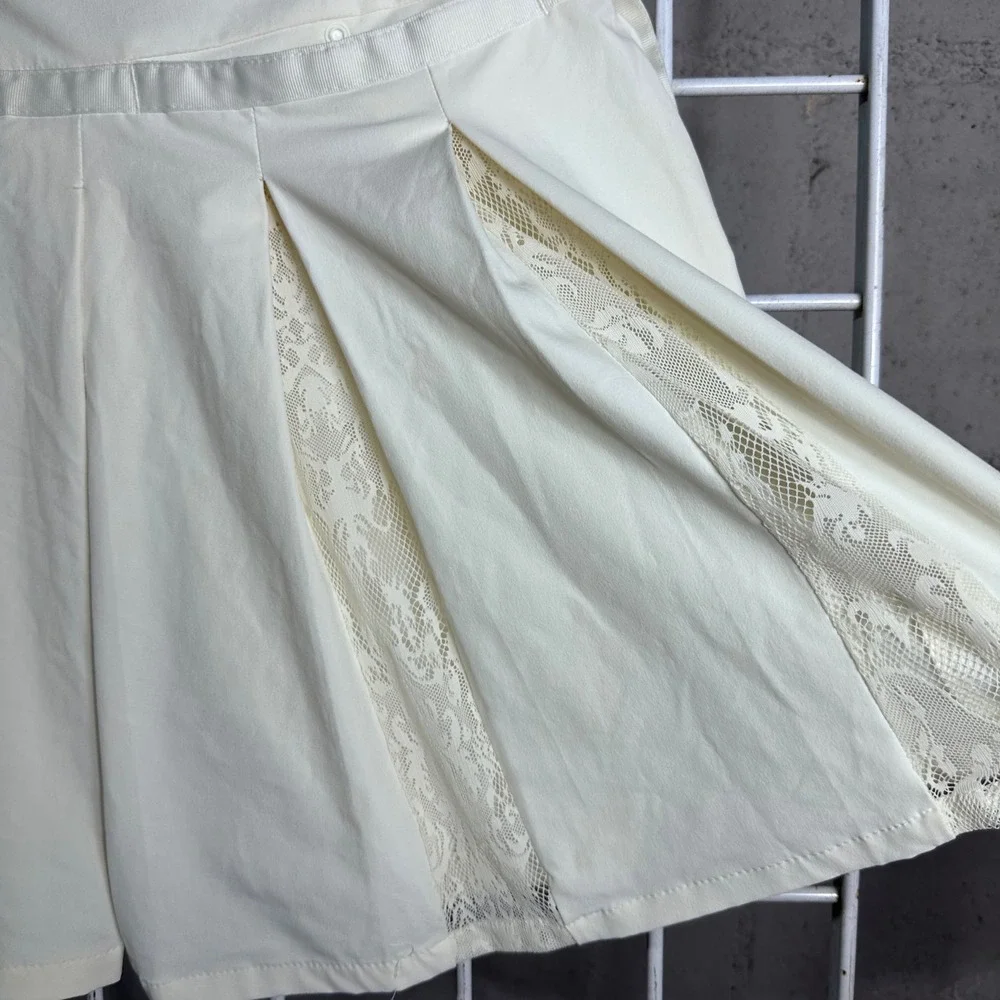 Nike Dri-FIT White Pleated Tennis Skirt Lace trim Inset Skort XS preppy sporty